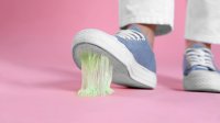 Shoe stepping on sticky gum
